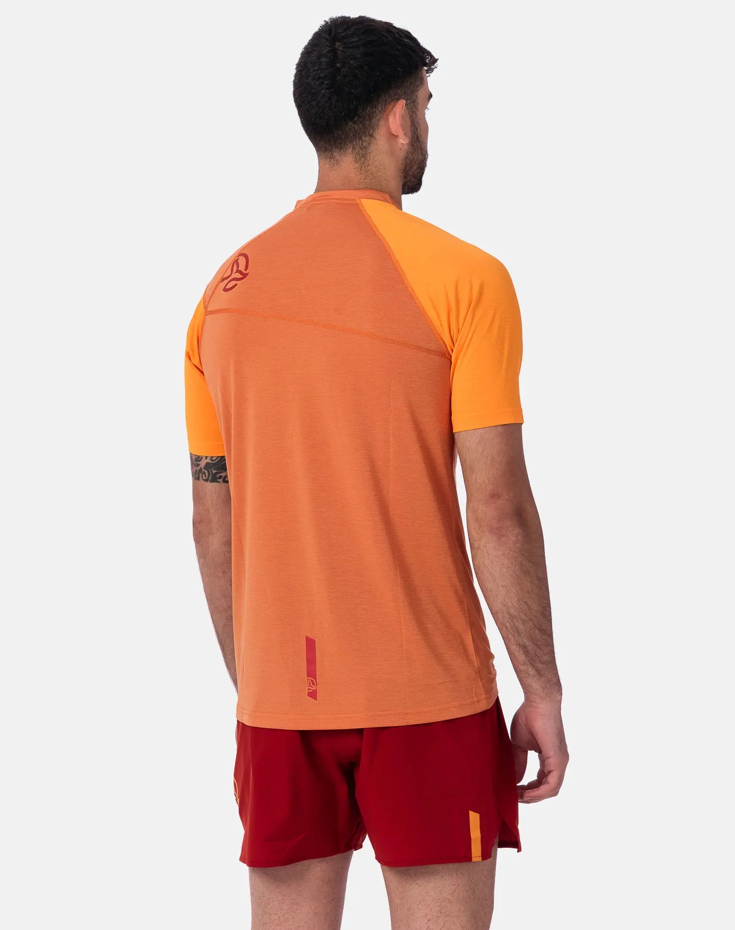 T-shirt tecnica arancione con Logo Ternua sulla spalla sinistra